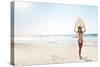 A Beautiful Surfer Girl at the Beach Holding up Her Surfboard-iko-Stretched Canvas