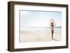 A Beautiful Surfer Girl at the Beach Holding up Her Surfboard-iko-Framed Photographic Print