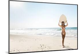 A Beautiful Surfer Girl at the Beach Holding up Her Surfboard-iko-Mounted Photographic Print