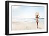 A Beautiful Surfer Girl at the Beach Holding up Her Surfboard-iko-Framed Photographic Print