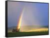 A Beaverslide Haystacker with Full Rainbow in the Big Hole Valley, Jackson, Montana, USA-Chuck Haney-Framed Stretched Canvas