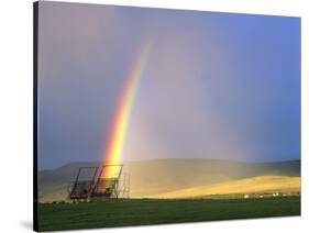 A Beaverslide Haystacker with Full Rainbow in the Big Hole Valley, Jackson, Montana, USA-Chuck Haney-Stretched Canvas