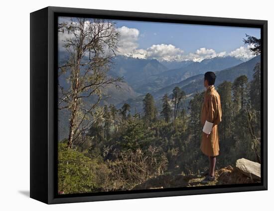 A Bhutanese Man in National Costume Views an Eastern Himalayan Mountain Range from the 11,000-Foot--Nigel Pavitt-Framed Stretched Canvas