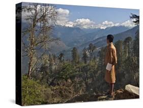 A Bhutanese Man in National Costume Views an Eastern Himalayan Mountain Range from the 11,000-Foot--Nigel Pavitt-Stretched Canvas