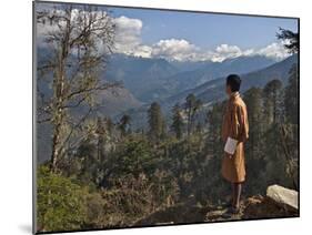 A Bhutanese Man in National Costume Views an Eastern Himalayan Mountain Range from the 11,000-Foot--Nigel Pavitt-Mounted Photographic Print