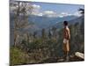 A Bhutanese Man in National Costume Views an Eastern Himalayan Mountain Range from the 11,000-Foot--Nigel Pavitt-Mounted Photographic Print