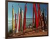 A Bhutanese Man Straightens a Prayer Flag at a Buddhist Shrine-null-Framed Photographic Print