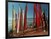 A Bhutanese Man Straightens a Prayer Flag at a Buddhist Shrine-null-Framed Photographic Print