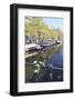 A Bicycle Decorated with Flowers by a Canal, Amsterdam, Netherlands, Europe-Amanda Hall-Framed Photographic Print