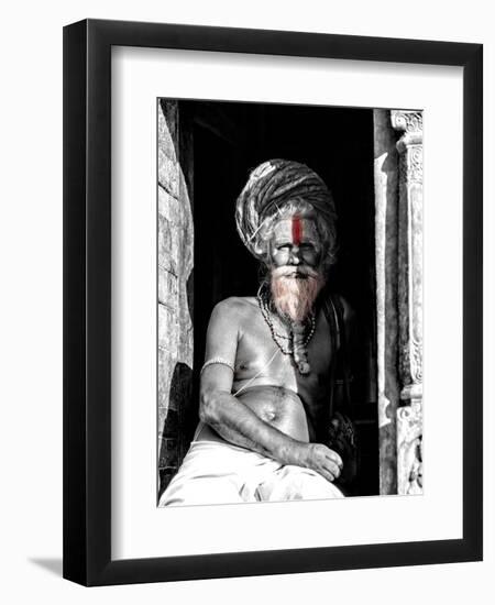 A black and white picture of a sadhu (yogi) at Pashupatinath Temple in Kathmandu, Nepal-David Chang-Framed Photographic Print