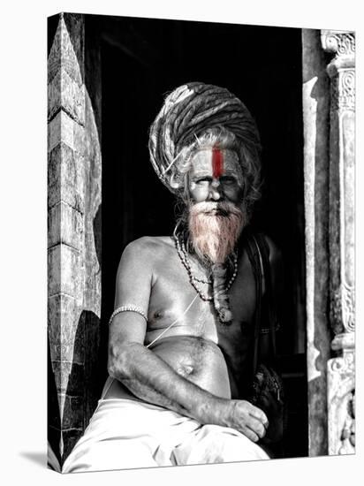 A black and white picture of a sadhu (yogi) at Pashupatinath Temple in Kathmandu, Nepal-David Chang-Stretched Canvas