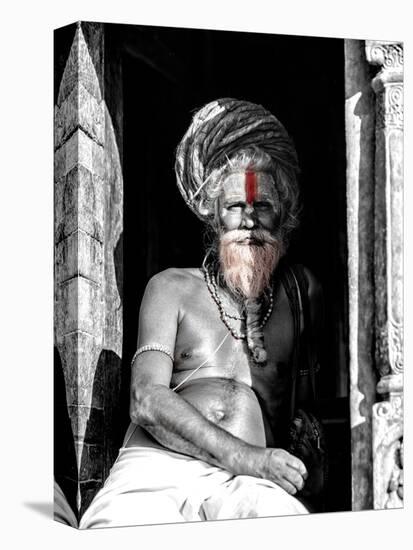 A black and white picture of a sadhu (yogi) at Pashupatinath Temple in Kathmandu, Nepal-David Chang-Stretched Canvas