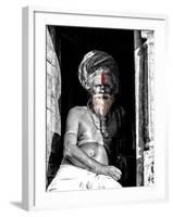 A black and white picture of a sadhu (yogi) at Pashupatinath Temple in Kathmandu, Nepal-David Chang-Framed Photographic Print