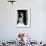 A black and white picture of a sadhu (yogi) at Pashupatinath Temple in Kathmandu, Nepal-David Chang-Framed Photographic Print displayed on a wall