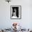 A black and white picture of a sadhu (yogi) at Pashupatinath Temple in Kathmandu, Nepal-David Chang-Framed Photographic Print displayed on a wall