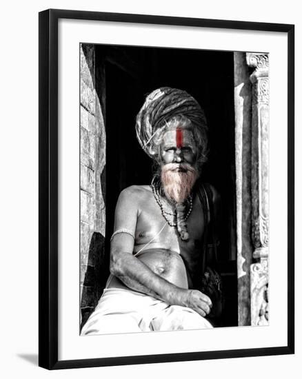 A black and white picture of a sadhu (yogi) at Pashupatinath Temple in Kathmandu, Nepal-David Chang-Framed Photographic Print