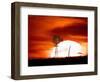 A Blazing Sun Drops Behind a Windmill-null-Framed Photographic Print