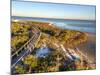 A Boardwalk Curves over the Vegetation on the Dunes in Big Lagoon State Park near Pensacola, Florid-Colin D Young-Mounted Photographic Print