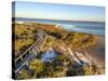 A Boardwalk Curves over the Vegetation on the Dunes in Big Lagoon State Park near Pensacola, Florid-Colin D Young-Stretched Canvas