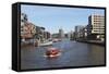 A Boat on a Canal in the Recently Developed Hafencity District of Hamburg, Germany, Europe-Stuart Forster-Framed Stretched Canvas