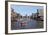 A Boat on a Canal in the Recently Developed Hafencity District of Hamburg, Germany, Europe-Stuart Forster-Framed Photographic Print