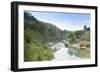 A Boat on the River Kwai with the Pow-Built Wampoo Viaduct Behind-Alex Robinson-Framed Photographic Print