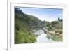 A Boat on the River Kwai with the Pow-Built Wampoo Viaduct Behind-Alex Robinson-Framed Photographic Print