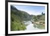 A Boat on the River Kwai with the Pow-Built Wampoo Viaduct Behind-Alex Robinson-Framed Photographic Print