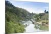 A Boat on the River Kwai with the Pow-Built Wampoo Viaduct Behind-Alex Robinson-Mounted Photographic Print