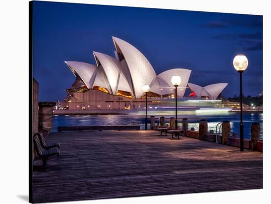 A Boat Passes by the Sydney Opera House, UNESCO World Heritage Site, During Blue Hour-Jim Nix-Stretched Canvas