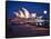 A Boat Passes by the Sydney Opera House, UNESCO World Heritage Site, During Blue Hour-Jim Nix-Framed Stretched Canvas