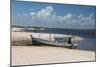 A Boat Sits on Rio Preguicas River Bank Near Lencois Maranhenses National Park-Alex Saberi-Mounted Photographic Print