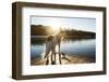 A Border Collie Looks Out over a Lake During an Autumn Sunrise in Eastern Pennsylvania-Vince M. Camiolo-Framed Photographic Print