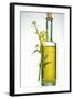 A Bottle of Rapeseed Oil with Flowers-Bodo A^ Schieren-Framed Photographic Print