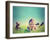 A Boy and a Tiny Chihuahua in the Grass-graphicphoto-Framed Photographic Print