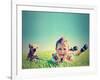 A Boy and a Tiny Chihuahua in the Grass-graphicphoto-Framed Photographic Print