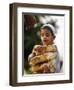 A Boy Carries Rusk as He Assists Others to Send a Consignment of Relief Supplies to Uri-null-Framed Photographic Print