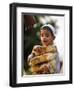 A Boy Carries Rusk as He Assists Others to Send a Consignment of Relief Supplies to Uri-null-Framed Photographic Print