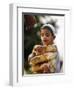 A Boy Carries Rusk as He Assists Others to Send a Consignment of Relief Supplies to Uri-null-Framed Photographic Print