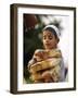 A Boy Carries Rusk as He Assists Others to Send a Consignment of Relief Supplies to Uri-null-Framed Photographic Print