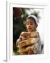 A Boy Carries Rusk as He Assists Others to Send a Consignment of Relief Supplies to Uri-null-Framed Photographic Print