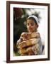 A Boy Carries Rusk as He Assists Others to Send a Consignment of Relief Supplies to Uri-null-Framed Photographic Print