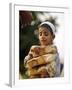 A Boy Carries Rusk as He Assists Others to Send a Consignment of Relief Supplies to Uri-null-Framed Photographic Print