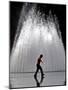 A Boy Crosses Over a Fountain-null-Mounted Photographic Print