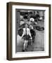 A Boy Gives a Ride to a Little Girl and a 9-Foot Teddy Bear at the Opening of the British Toy Fair-null-Framed Photographic Print