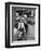 A Boy Gives a Ride to a Little Girl and a 9-Foot Teddy Bear at the Opening of the British Toy Fair-null-Framed Photographic Print