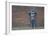 A Boy in a Robot Outfit-Clive Nolan-Framed Photographic Print