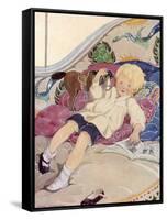 A Boy Lying on a Bed with a Book and a Toy Horse-Anne Anderson-Framed Stretched Canvas