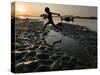 A Boy Plays on the Banks of the River Brahmaputra in Gauhati, India, Friday, October 27, 2006-Anupam Nath-Stretched Canvas