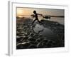 A Boy Plays on the Banks of the River Brahmaputra in Gauhati, India, Friday, October 27, 2006-Anupam Nath-Framed Photographic Print